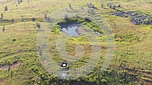 Flying over a Small Pond in the Shape of a Heart