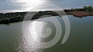 Flying over the tideland and lake in Conwy area in north wales