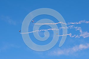 Flying parachutists in the sky at an air show. Editorial