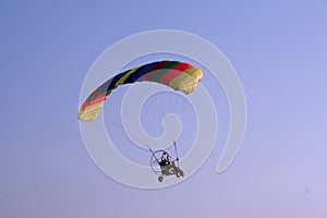 Flying paraglider in the sky photo