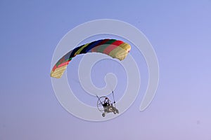 Flying paraglider in the sky