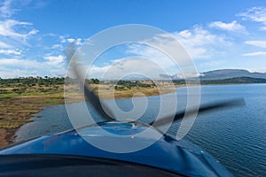 Flying Plane Low Dam Waters Shoreline