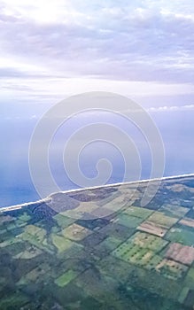 Flying in plane over coast of Oaxaca Mexico