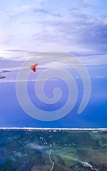 Flying in plane over coast of Oaxaca Mexico