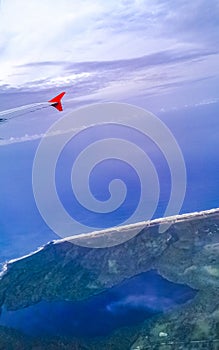 Flying in plane over coast of Oaxaca Mexico