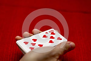 Flying playing cards in a hands
