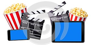 Flying popcorn, film clapper board and phone isolated on white background