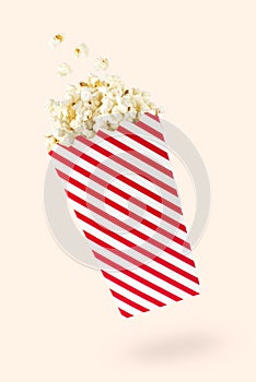 Flying popcorn with red-touched packet