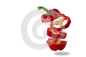 Flying red pepper isolated on white background. Food levitation concept