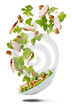 Flying salad isolated on white