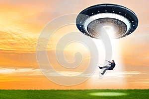 The flying saucer abducting young businessman