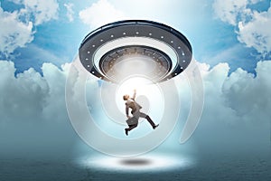 The flying saucer abducting young businessman