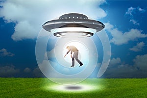 The flying saucer abducting young businessman