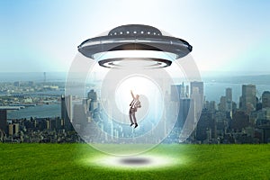 The flying saucer abducting young businessman