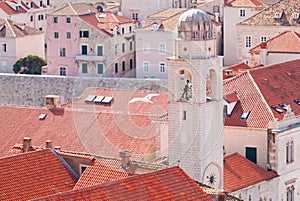 Flying seagull on the background of blurred Dubrovnik old city center. Aerial view.
