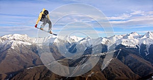 Flying snowboarder on mountains