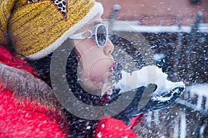 Flying snowflakes and girl