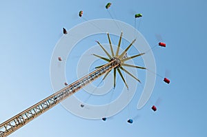 Flying swing carousel on fun fair