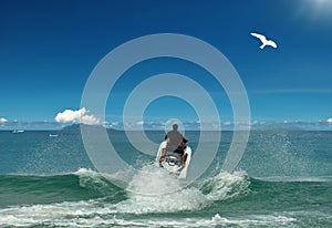 Flying to sun. Jet ski & bird.