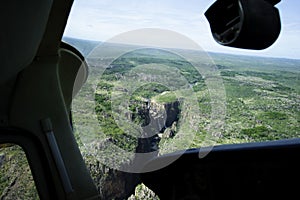 Flying towards waterfall POV from light aircraft