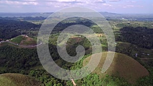 Flyover aerial view of Chocolate hills. Bohol, Philippines