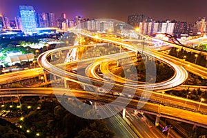 Flyover in modern city at night