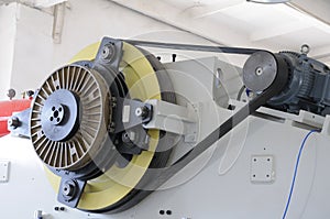 Flywheel for a stamp.