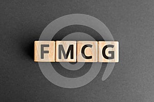 FMCG - acronym from wooden blocks with letters