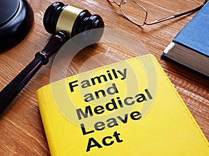 FMLA - Family and Medical Leave Act is shown on the conceptual business photo photo