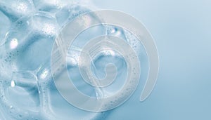 Foam border design on blue background. Liquid soap bubbles, Foam bubbles background