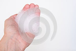 Foam bubble on hand female on white background beauty health care concept design with copy space