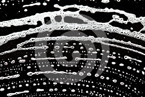 Foam bubbles abstract dark background