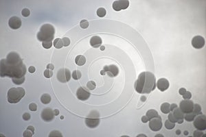 Foam bubbles snowing in the air abstract background