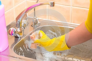 Foam cleaning dirty kitchen sink