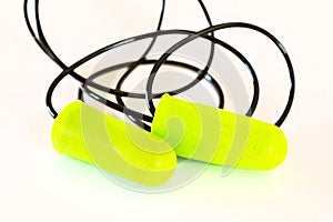 Foam ear plugs on white photo