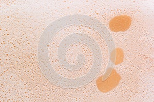 Foam lather texture background. White cleanser gel, shaving foam, shampoo bubbles photo