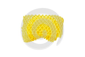 Foam plastic mesh net yellow isolated on white background.