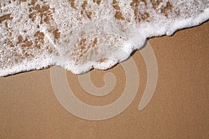Foam on sand