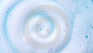 Foam swirl background. Liquid soap bubbles, Froth bubbles backdrop. Soap foam white backdrop