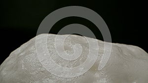 Foam on top of beer glass.