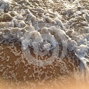 Foam wave of the Indian ocean at sunset 2