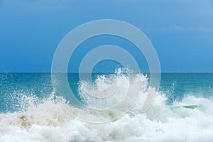 Foam wave, running on the sandy shore