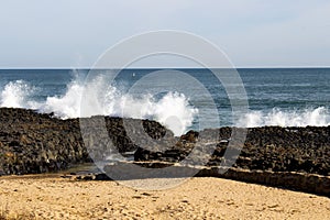 Foaming backwash at ocean beach Bunbury, Western Australia. photo