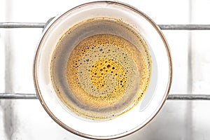 Foaming coffee on top