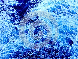 Foaming ocean water texture as background
