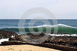 Foaming white backwash at Ocean Beach Bunbury, Western Australia. photo