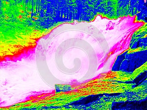 Foamy water level of waterfall, curves between boulders of rapids. Water of mountain river in infrared photo. Amazing thermography