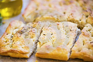 Focaccia bread with oregano and olive oil.Fresh italian foccacia bread closeup