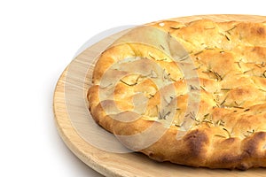 Focaccia in a wooden plate