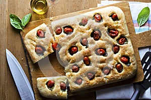 Foccacia on wooden table. photo